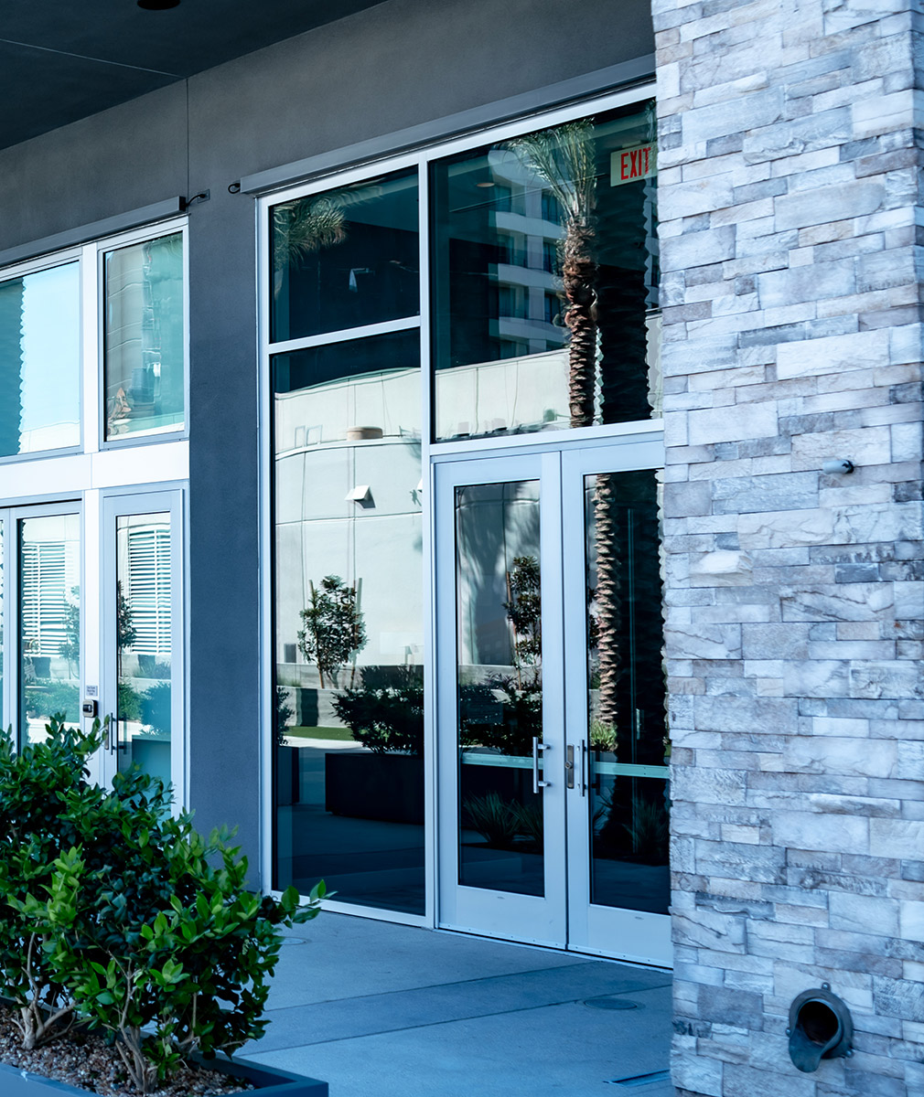 Tall commercial glass entrance installation